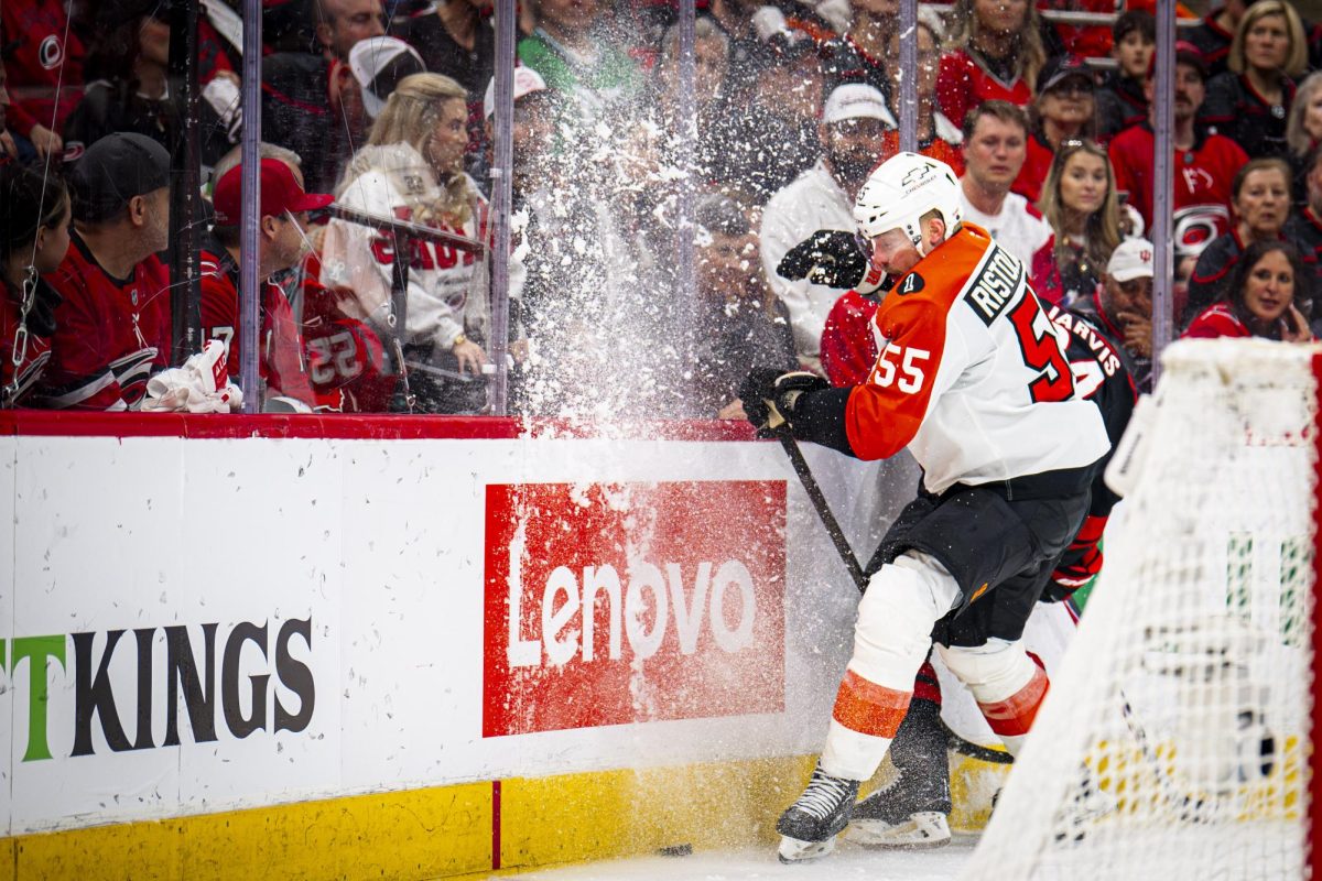Flyers defenseman Rasmus Ristolainen crashes into the boards during Game Two of the Eastern Conference Semifinals between the Carolina Hurricanes and Philadelphia Flyers in the Lenovo Center on Monday, May 4, 2026. The Hurricanes defeated the Flyers 3-2 in overtime.