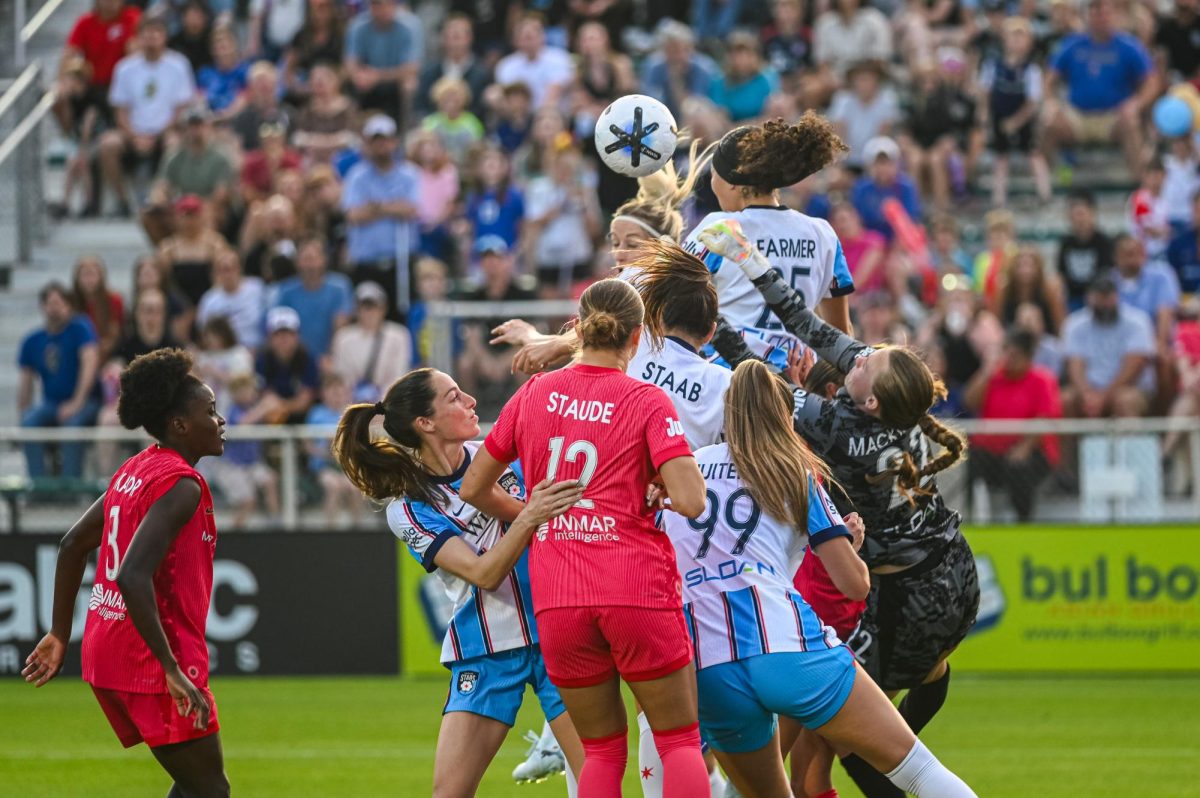 Chicago goalkeeper Halle Mackiewicz attempts to punch the ball away during the game between North Carolina Courage and Chicago Stars FC at WakeMed Soccer Park on Saturday, May 16, 2026. Courage beat Chicago 4-0.