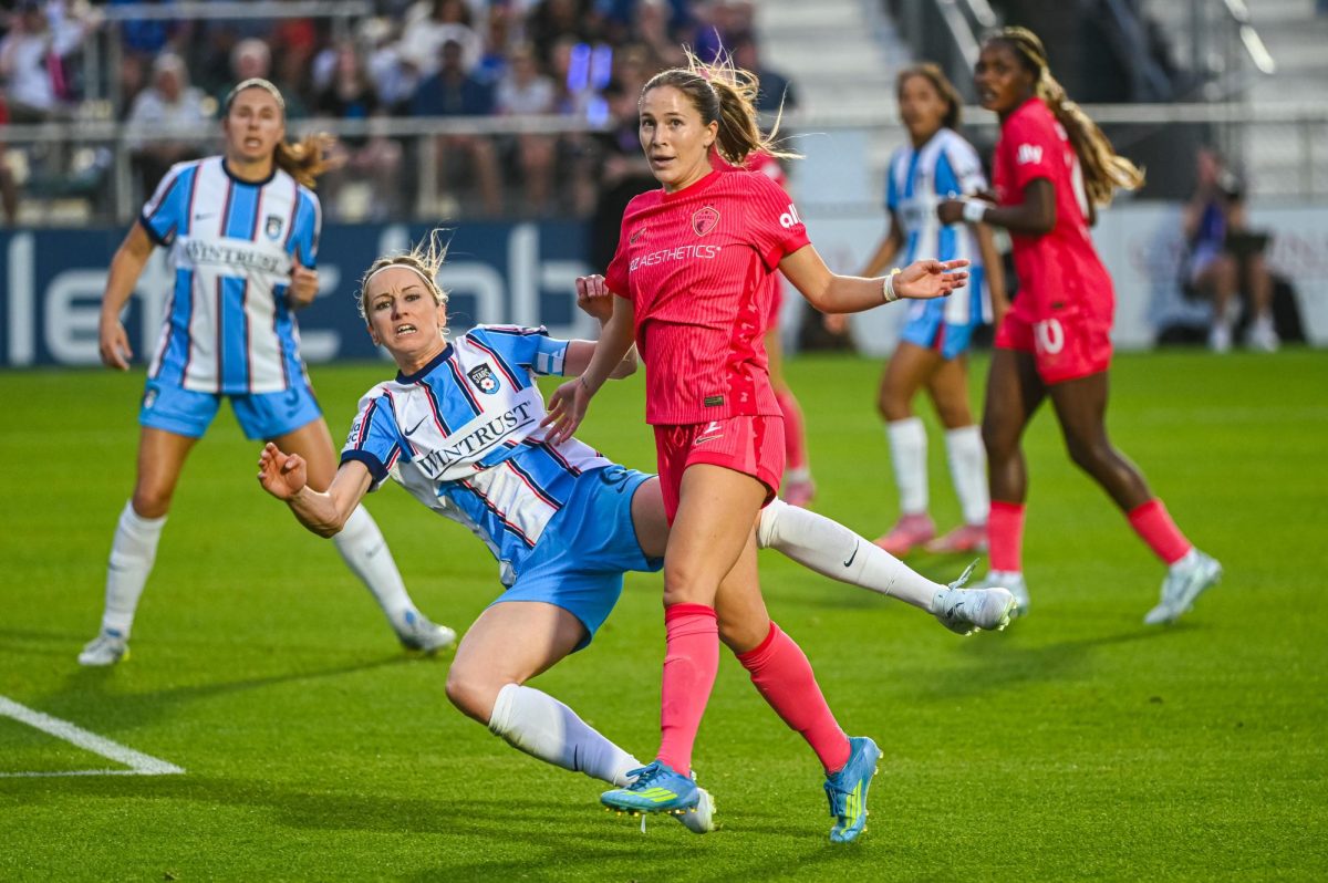 Courage midfielder Ashley Sanchez pushes off Chicago defender Kathrin Hendrich during the game between North Carolina Courage and Chicago Stars FC at WakeMed Soccer Park on Saturday, May 16, 2026. Courage beat Chicago 4-0.