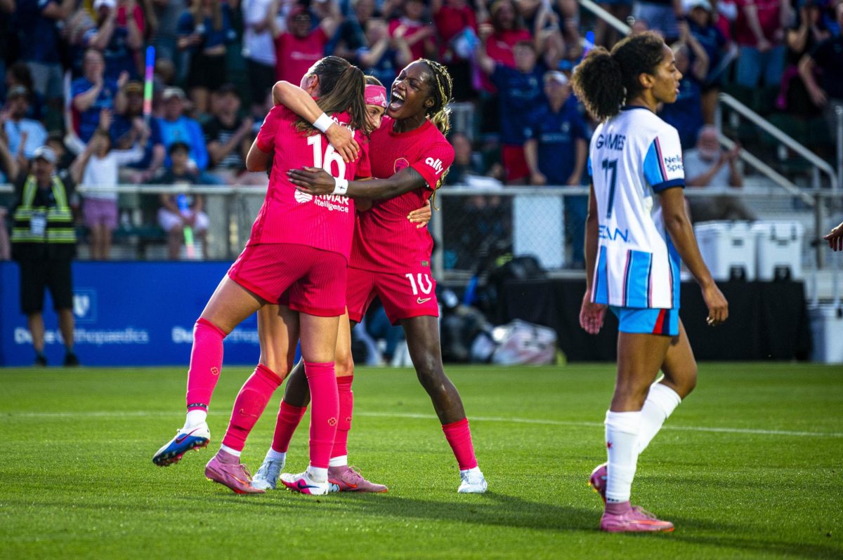 Courage forwards Ally Schlegel (35) and Evelyn Ijeh (10) celebrate with midfielder Riley Jackson (16) after scoring a goal during the game against the Chicago Stars in First Horizon Stadium at WakeMed Soccer Park on Saturday, May 16, 2026. The Courage defeated the Stars 4-0.