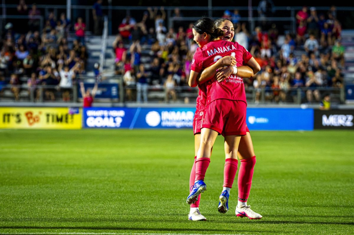 Courage midfielders Manaka Matsukubo (34) and Riley Jackson (16) celebrate after Manaka's goal in the 85th minute during the game against the Chicago Stars in First Horizon Stadium at WakeMed Soccer Park on Saturday, May 16, 2026. The Courage defeated the Stars 4-0.