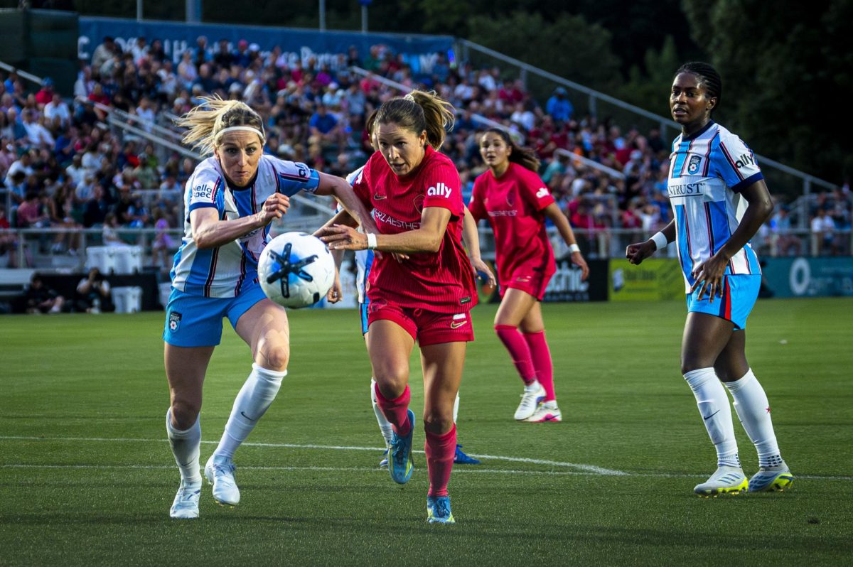 NC Courage midfielder Ashley Sanchez (2) and Chicago Stars defenseman Kathrin Hendrich (6) chase after the ball during the game in First Horizon Stadium at WakeMed Soccer Park on Saturday, May 16, 2026. The Courage defeated the Stars 4-0.