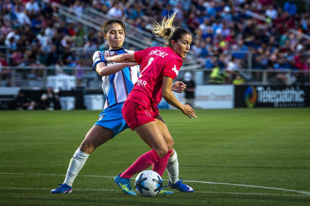 NC Courage FC midfielder Ashley Sanchez (2) fends off Chicago Stars FC midfielder Manaka Hayashi (16) during the game in First Horizon Stadium at WakeMed Soccer Park on Saturday, May 16, 2026. The Courage defeated the Stars 4-0.