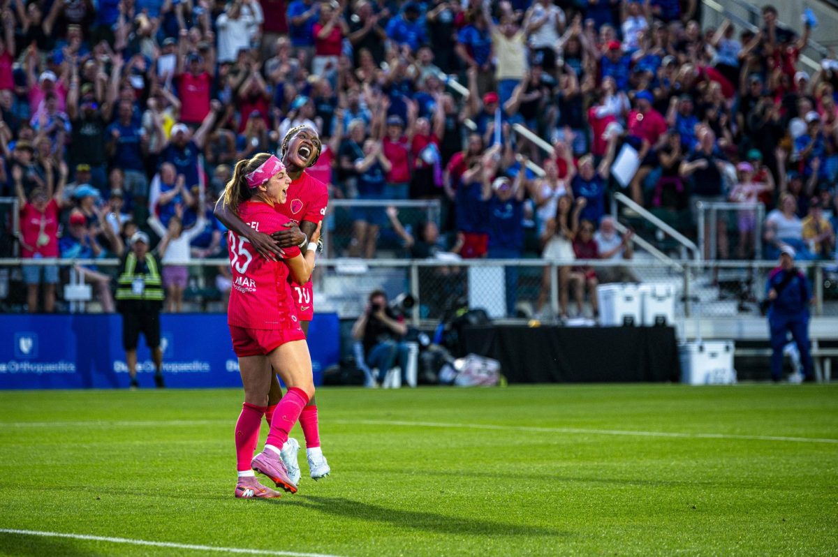 Courage forwards Ally Schlegel (35) and Evelyn Ijeh (10) celebrate together after scoring a goal during the game against the Chicago Stars in First Horizon Stadium at WakeMed Soccer Park on Saturday, May 16, 2026. The Courage defeated the Stars 4-0.