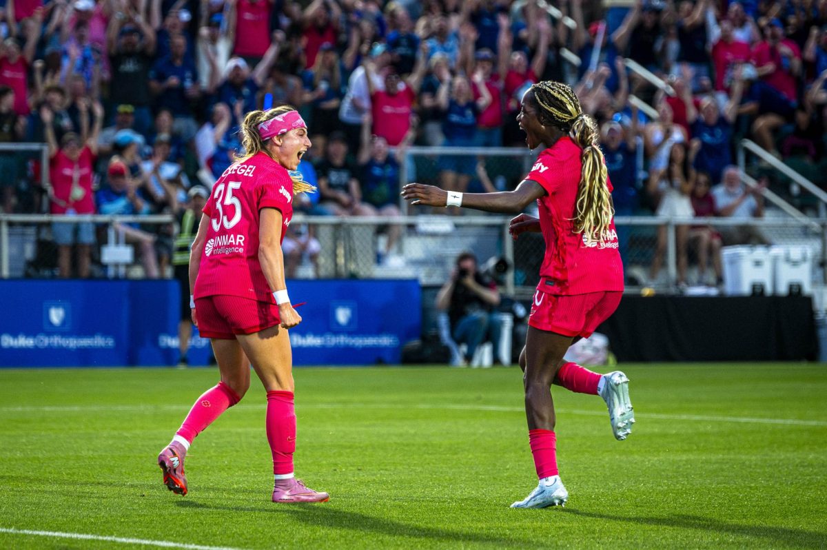 Courage forwards Ally Schlegel (35) and Evelyn Ijeh (10) celebrate together after scoring a goal during the game against the Chicago Stars in First Horizon Stadium at WakeMed Soccer Park on Saturday, May 16, 2026. The Courage defeated the Stars 4-0.