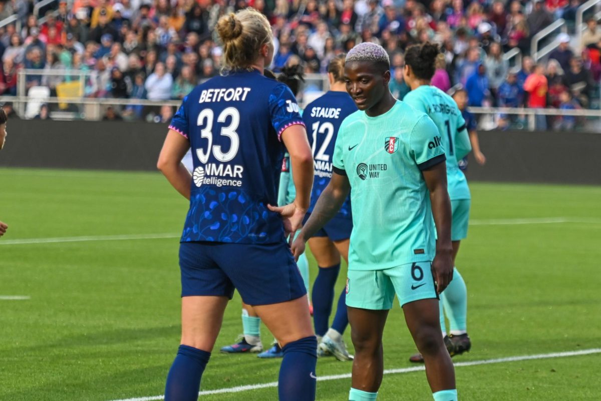 Forward Temwa Chawinga defends Forward Hannah Betfort during a corner in the game between the North Carolina Courage and Kansas City Current at First Horizon Stadium on Saturday, May. 2, 2026. There were 10,031 people in attendance, ranking third overall in club history. Courage fell to the Current 2-1.