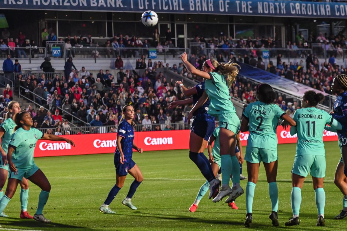 Defender Kayla Sharples and Midfielder Riley Jackson jump for the ball on a corner kick during the game between the North Carolina Courage and Kansas City Current at First Horizon Stadium on Saturday, May. 2, 2026. There were 10,031 people in attendance, ranking third overall in club history. Courage fell to the Current 2-1.