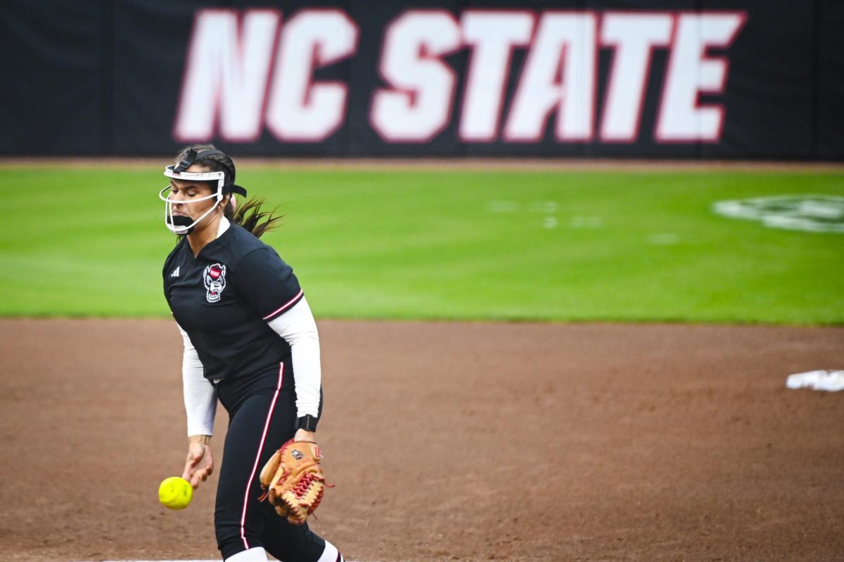 Redshirt-junior right-handed pitcher Wynne Gore launches a pitch during the game against Louisville at Dail Softball Stadium on Saturday, May 2, 2026. Gore threw for three innings. NC State defeated Louisville 10-6.
