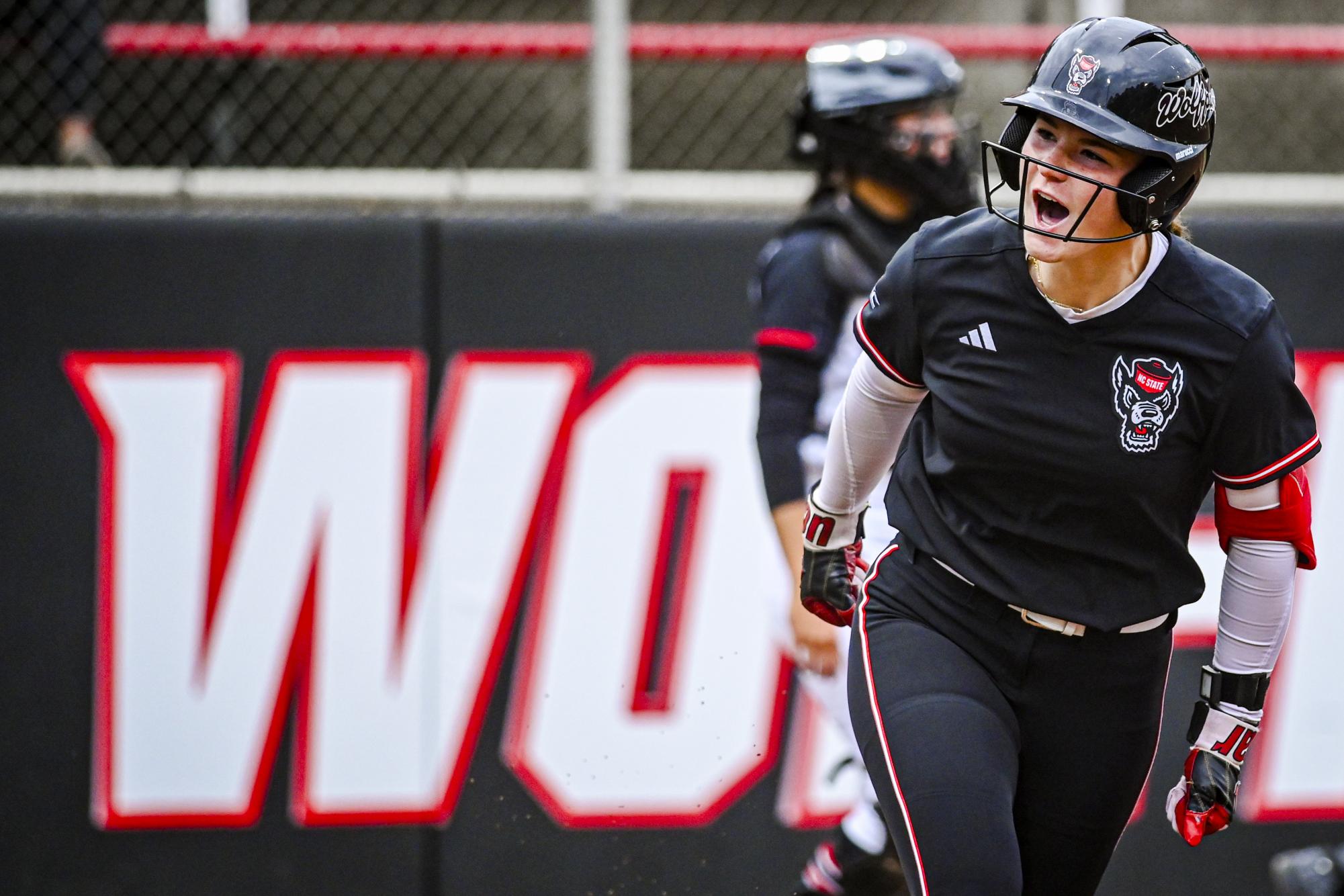 Freshman utility Morgen Talley cheers after hitting a home run during the game against Louisville at Dail Softball Stadium on Saturday, May 2, 2026. NC State defeated Louisville 10-6.