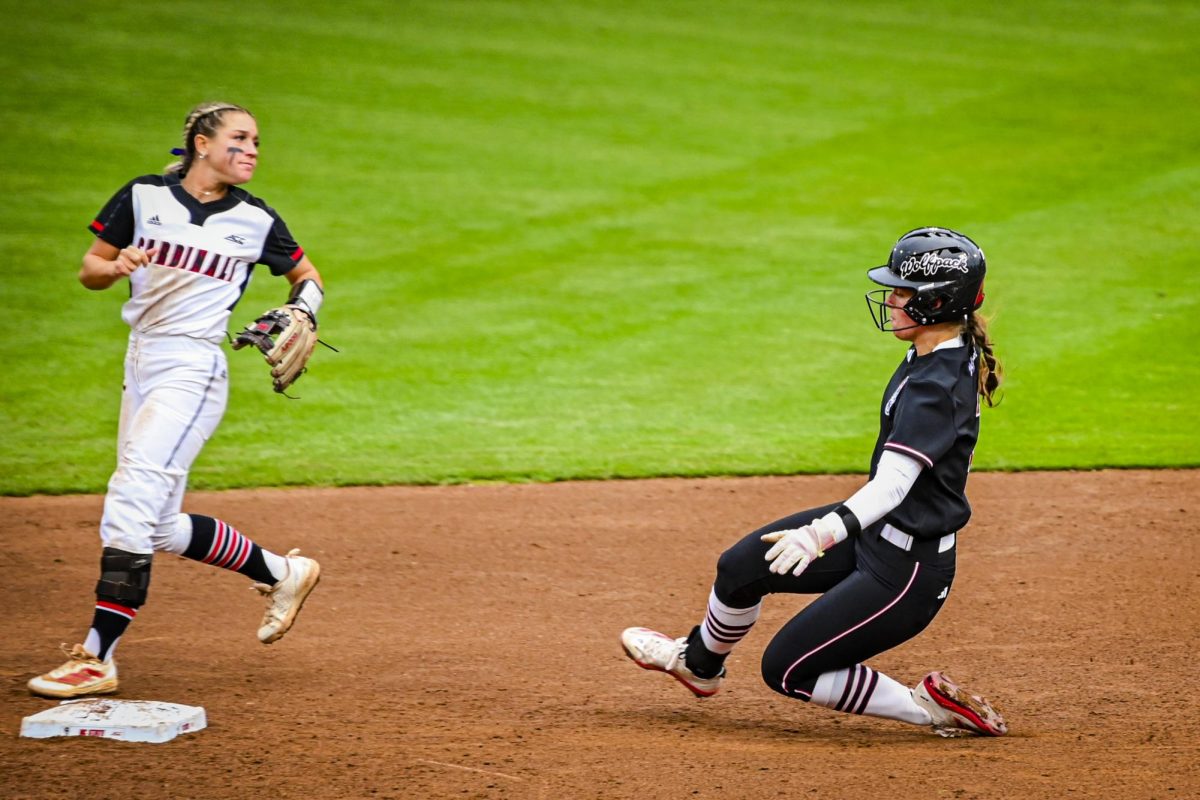 Senior catcher Ellington Whitaker slides into second during the game against Louisville at Dail Softball Stadium on Saturday, May 2, 2026. NC State defeated Louisville 10-6.