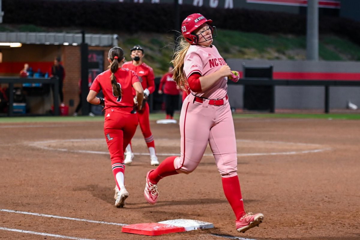 Senior utilities player Hannah Church gets thrown out at first base to end the game against Louisville at Dail Softball Stadium on Friday, May 1, 2026. The Wolfpack fell to the Cardinals 5-1.