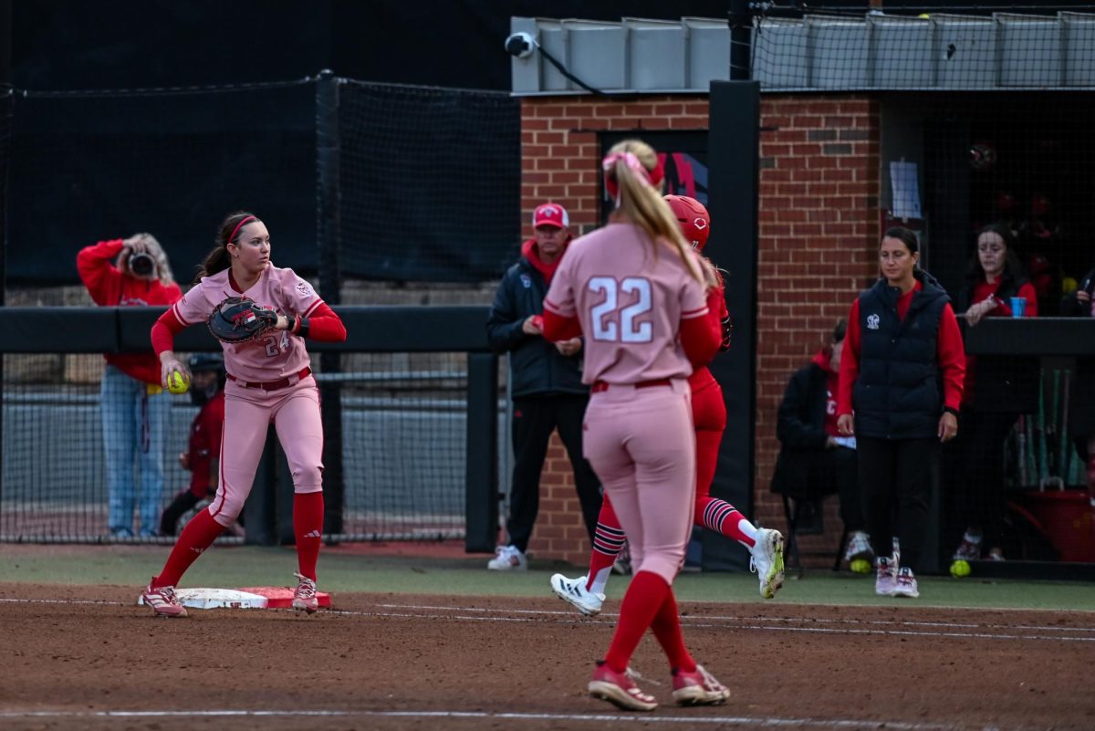 Sophomore infielder Taryn Massesy throws the ball during the game against Louisville at Dail Softball Stadium on Friday, May 1, 2026. The Wolfpack fell to the Cardinals 5-1.