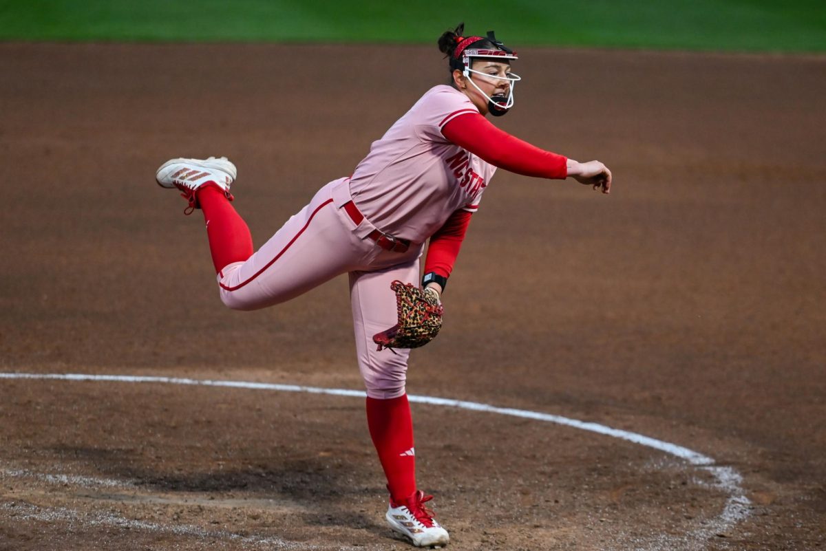 Graduate Student pitcher Charli Orsini pitches during the game against Louisville at Dail Softball Stadium on Friday, May 1, 2026. The Wolfpack fell to the Cardinals 5-1.