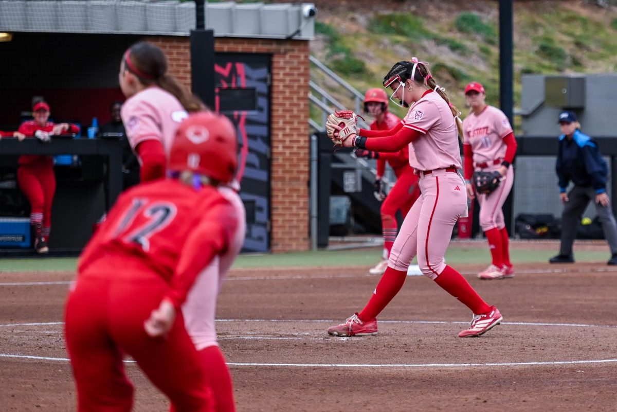Freshman utilities player Morgan Talley pitches during the game against Louisville at Dail Softball Stadium on Friday, May 1, 2026. Talley's home run in the second inning was the only run the Wolfpack had all game. The Wolfpack fell to the Cardinals 5-1.