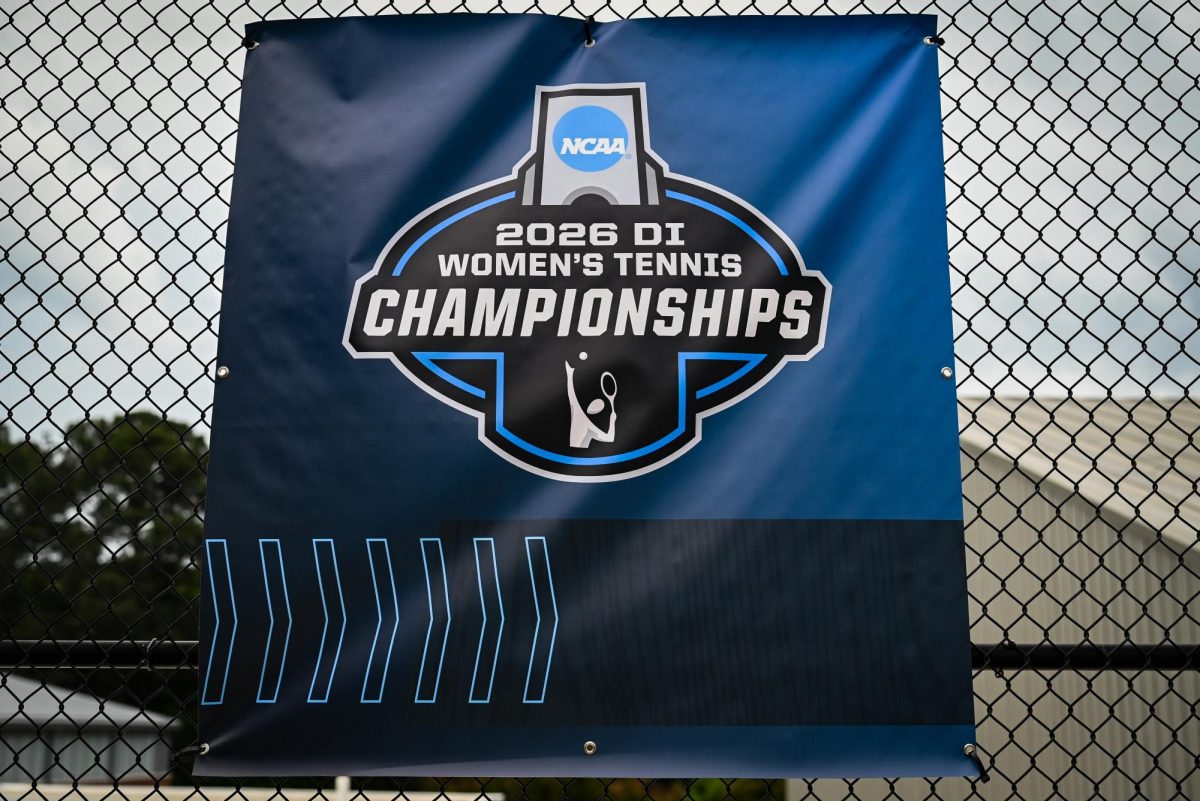A banner displays the logo of the NCAA Womens Tennis Championship at J.W. Isenhour Tennis Center on Saturday, May 2, 2026. 