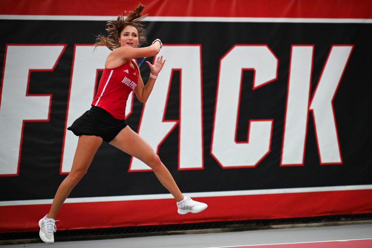 Junior Jasmine Conway follows through on a forehand during the match against UCF in the second round of the NCAA Womens Tennis Championship at J.W. Isenhour Tennis Center on Saturday, May 2, 2026. Conway defeated her singles opponent by a score of 6-3, 6-1 in straight sets. The Wolfpack defeated the Knights 4-0.