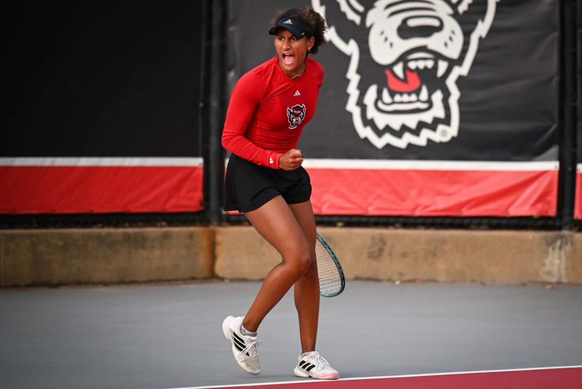Freshman Victoria Osuigwe shouts during the match against UCF in the second round of the NCAA Womens Tennis Championship at J.W. Isenhour Tennis Center on Saturday, May 2, 2026. Osuigwe defeated her singles opponent by a score of 6-1,6-0 in straight sets. The Wolfpack defeated the Knights 4-0.