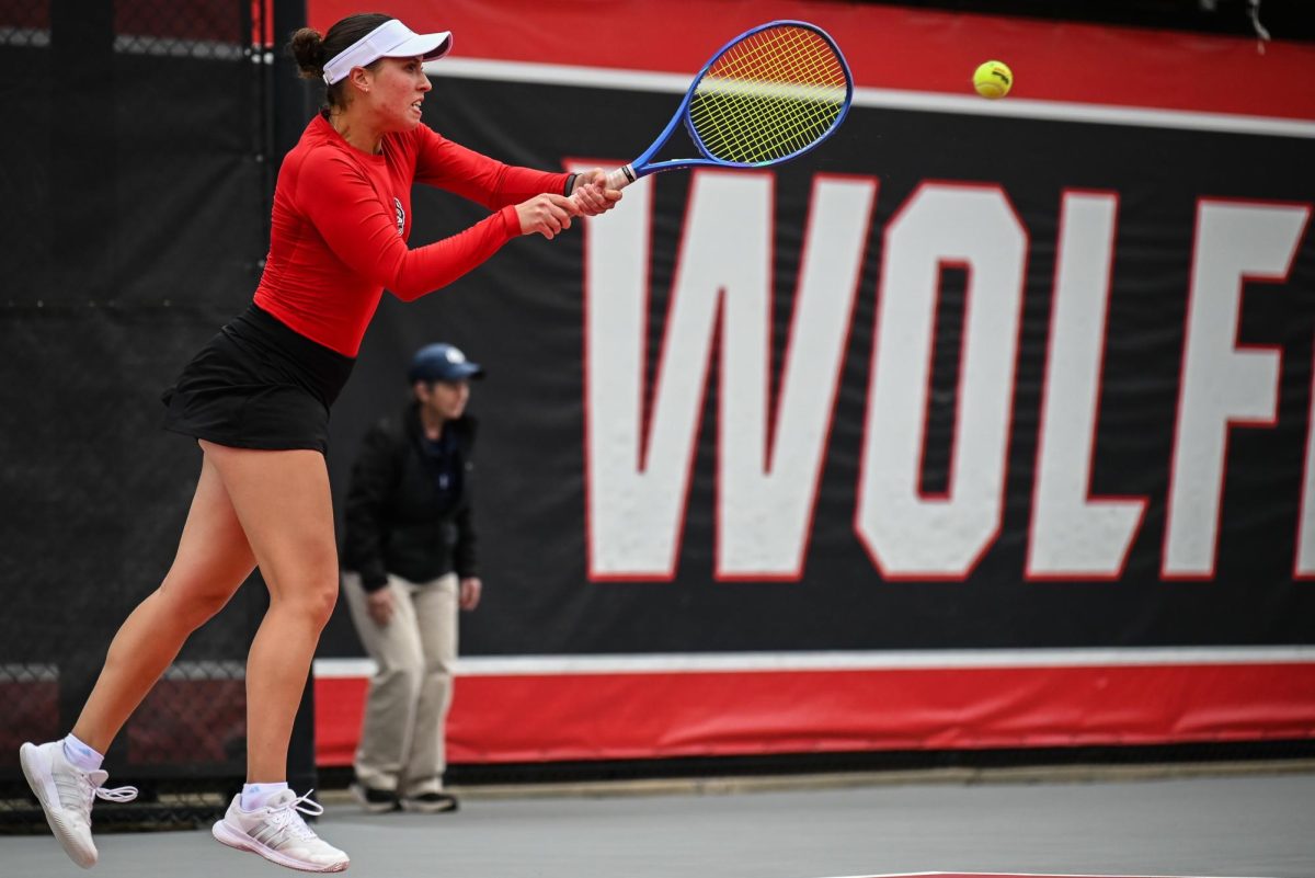 Senior Anna Zyryanova follows through on a backhand during the match against UCF in the second round of the NCAA Womens Tennis Championship at J.W. Isenhour Tennis Center on Saturday, May 2, 2026. The Wolfpack defeated the Knights 4-0.