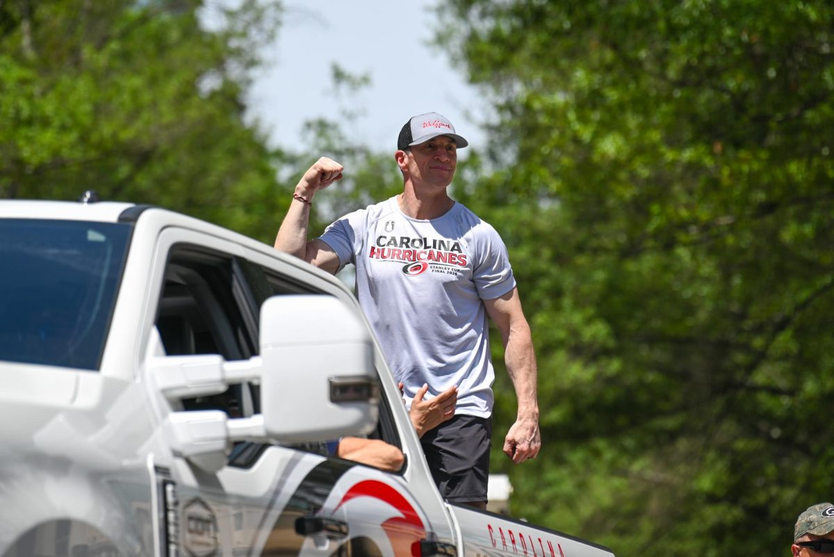 Carolina Hurricanes Head Coach Rod Brind’Amour smiles at the crowd during the Carolina Hurricanes Championship Parade in Downtown Raleigh on June 20, 2026. The parade celebrated the Hurricanes victory in the 2026 Stanley Cup after 20 years.