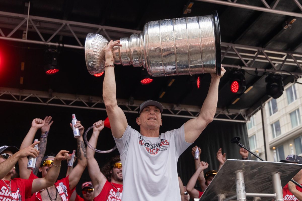 Head coach Rod Brind'Amour raises the Stanley Cup for the crowd during the Championship Celebration in downtown Raleigh on Saturday, June 20, 2026. This marked Brind'Amour's latest championship parade with the city after famously winning it as team captain.