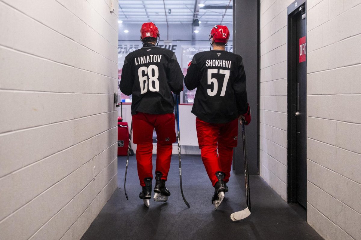 Defenseman Kurban Limatov (68) and Roman Shokhrin (57) walk to the rink during the Hurricanes 2026 Prospects Development Camp on Monday, June 29, 2026. Players competed in off-ice training and educational sessions, as well as on-ice sessions at Invisalign Arena.