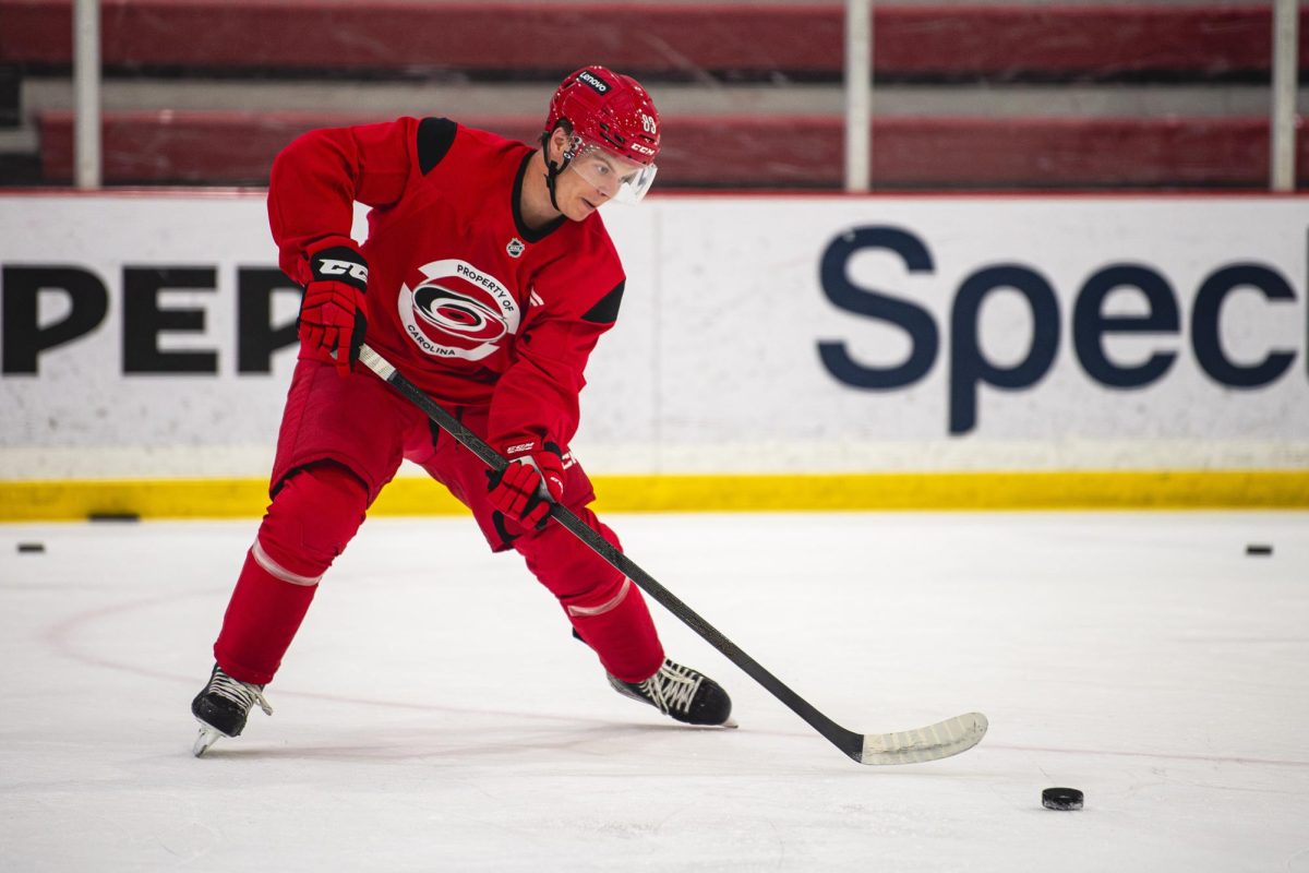Left wing Oskar Voullet (83) receives a puck during the Hurricanes 2026 Prospects Development Camp on Monday, June 29, 2026. Players competed in off-ice training and educational sessions, as well as on-ice sessions at Invisalign Arena.