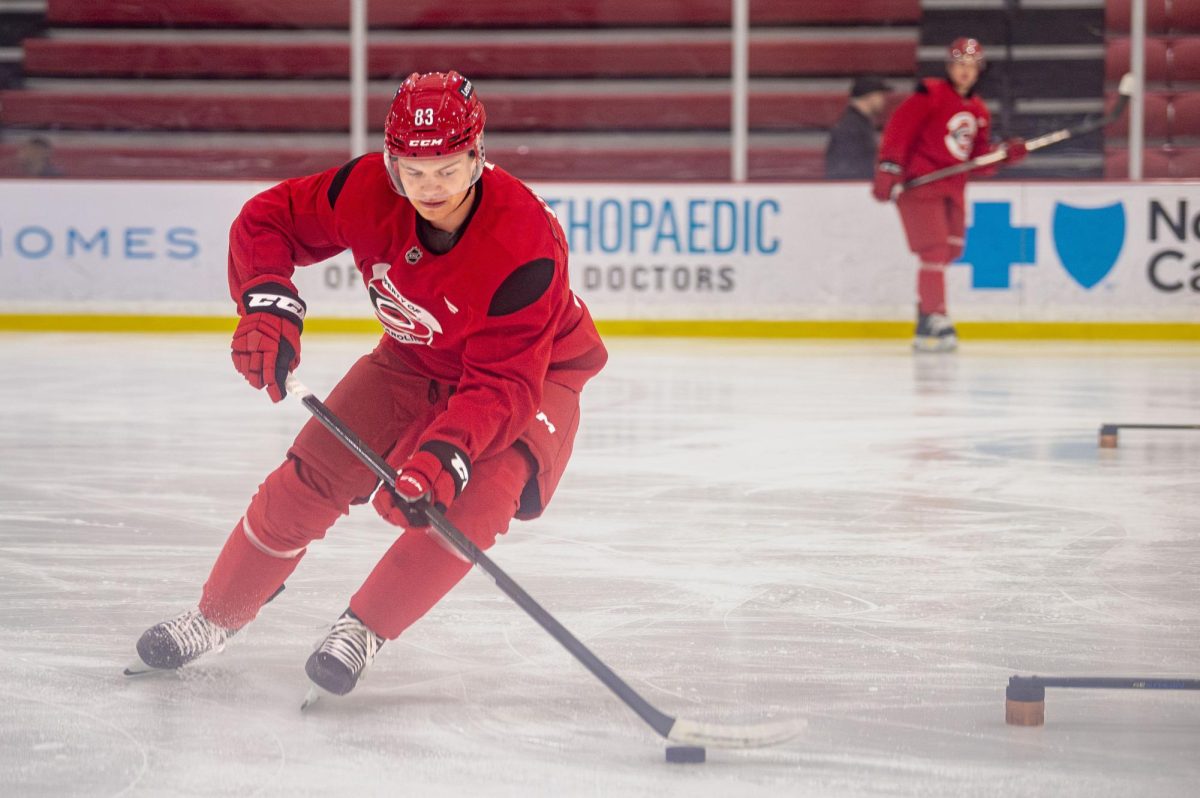 Left wing Oskar Voullet (83) controls a puck during the Hurricanes 2026 Prospects Development Camp on Monday, June 29, 2026. Players competed in off-ice training and educational sessions, as well as on-ice sessions at Invisalign Arena.