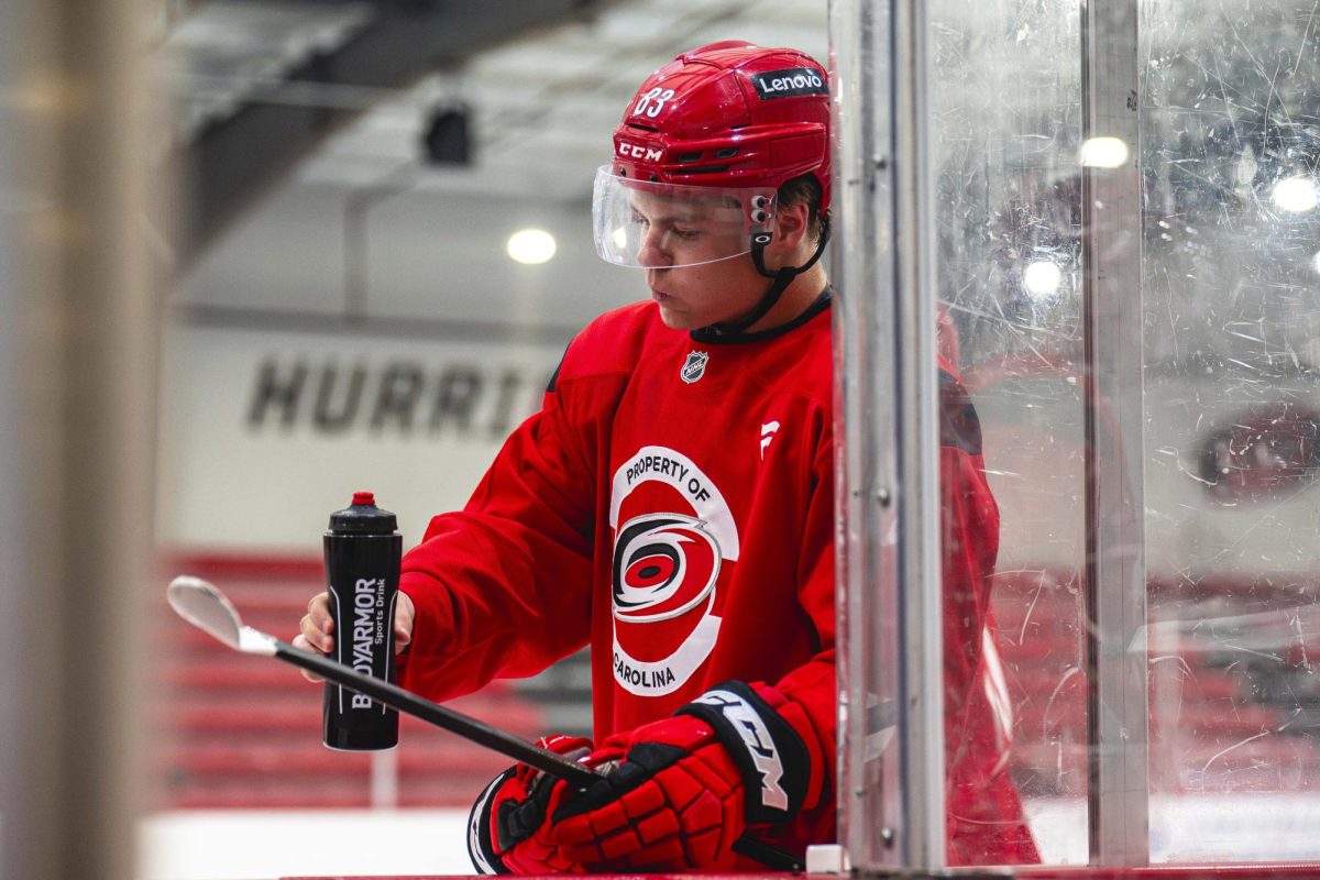 Left wing Oskar Voullet (83) puts down a water bottle during the Hurricanes 2026 Prospects Development Camp on Monday, June 29, 2026. Players competed in off-ice training and educational sessions, as well as on-ice sessions at Invisalign Arena.