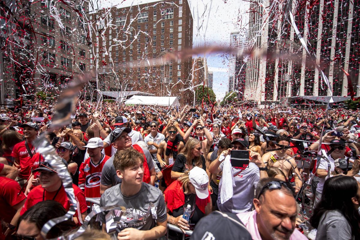 Confetti falls on the crowd during the Carolina Hurricanes Championship Celebration in downtown Raleigh on Saturday, June 20, 2026.