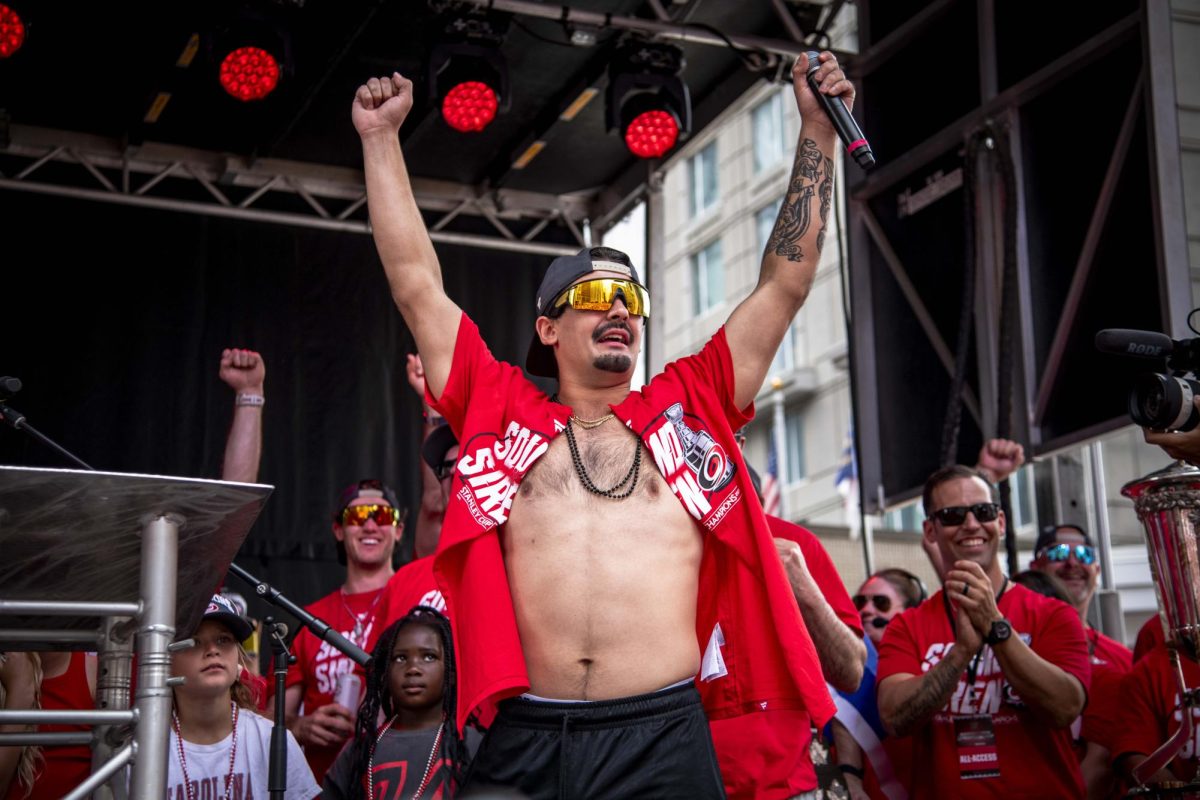 Winger Seth Jarvis pumps his fists during his remarks to the crowd at the Carolina Hurricanes Championship Celebration in downtown Raleigh on Saturday, June 20, 2026.