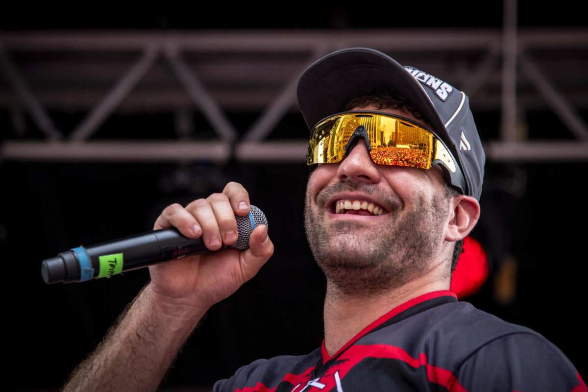 Winger Jordan Martinook looks out on the crowd during the Carolina Hurricanes Championship Celebration in downtown Raleigh on Saturday, June 20, 2026.