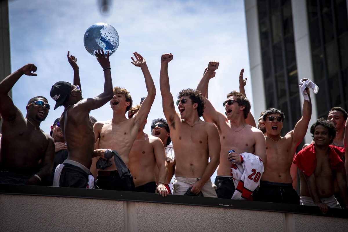 Shirtless hurricanes fans celebrate during the Championship Celebration Parade in downtown Raleigh on Saturday, June 20, 2026.