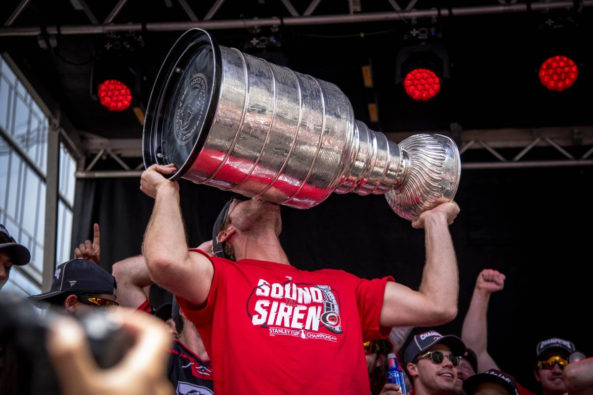 Center Jordan Staal kisses the Stanley Cup during the Carolina Hurricanes Championship Celebration in downtown Raleigh on Saturday, June 20, 2026.