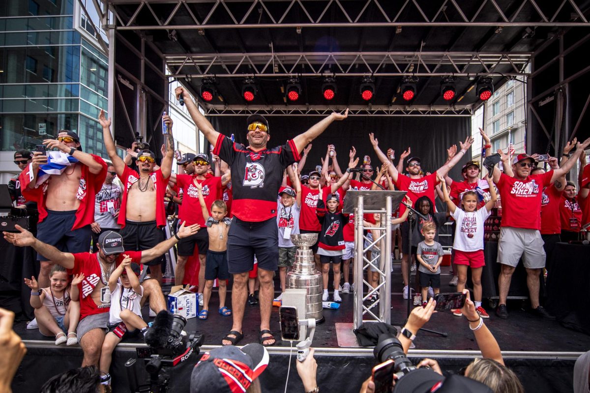 Hurricanes players lead the "Storm Surge" during the Carolina Hurricanes Championship Celebration in downtown Raleigh on Saturday, June 20, 2026.