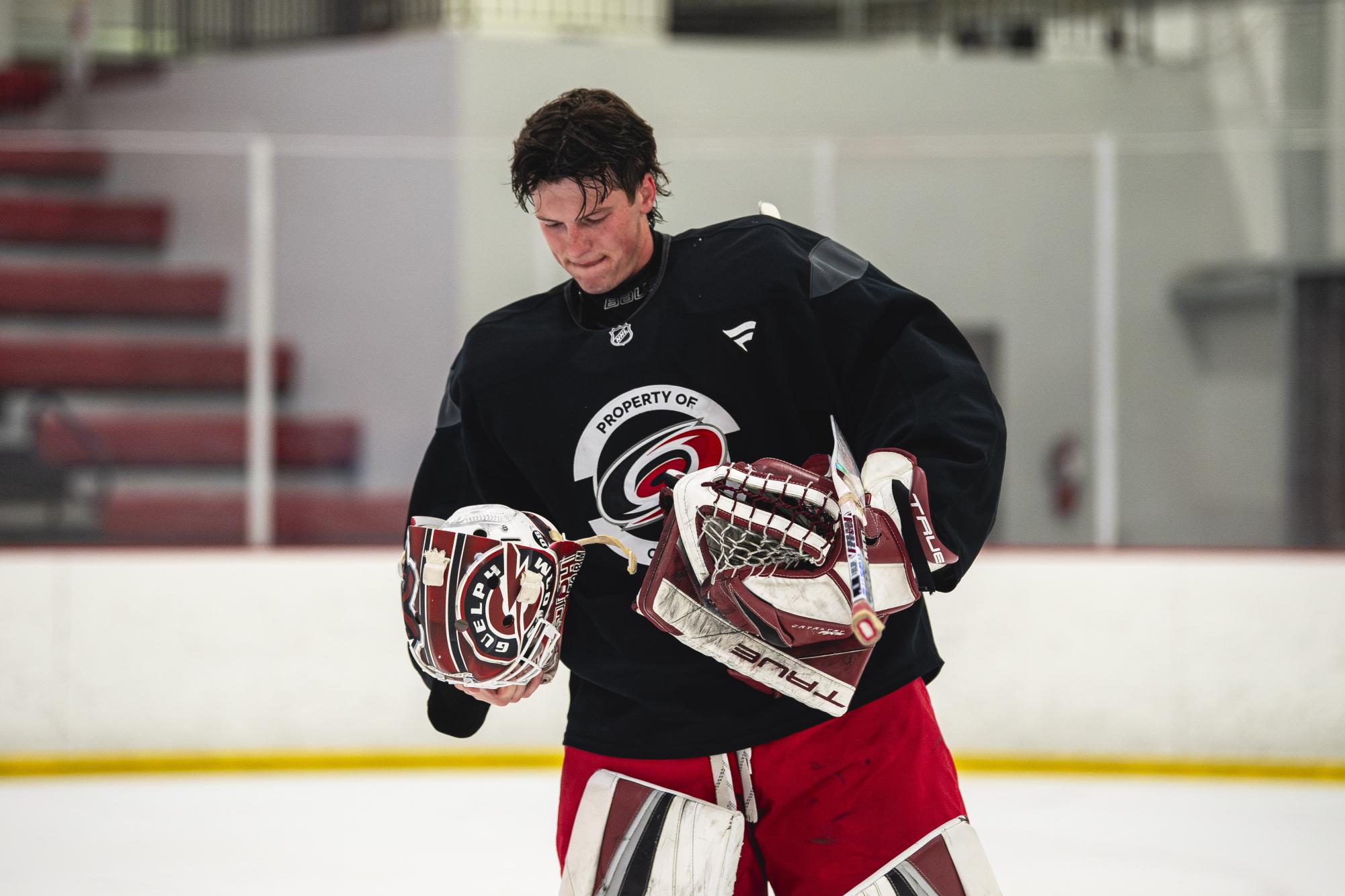 Goaltender Zachary Jovanovski (34) checks his helmet during the Hurricanes 2026 Prospects Development Camp on Monday, June 29, 2026. Jovanovski was drafted in the fifth round (165) by the Hurricanes on Saturday.