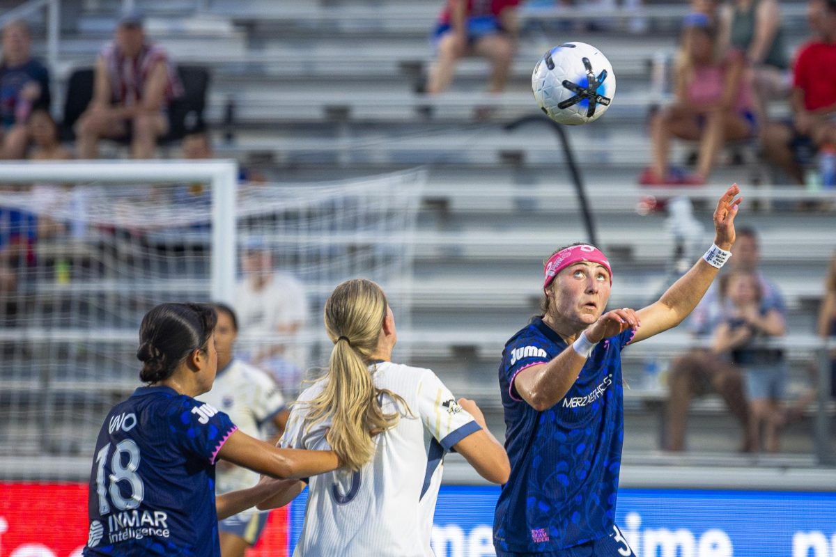 Forward Ally Schlegel (35) rises for a header during the game against Seattle Reign FC in First Horizon Stadium at WakeMed Soccer Park on Saturday, July 4, 2026. NC Courage FC defeated Seattle Reign FC 3-1.