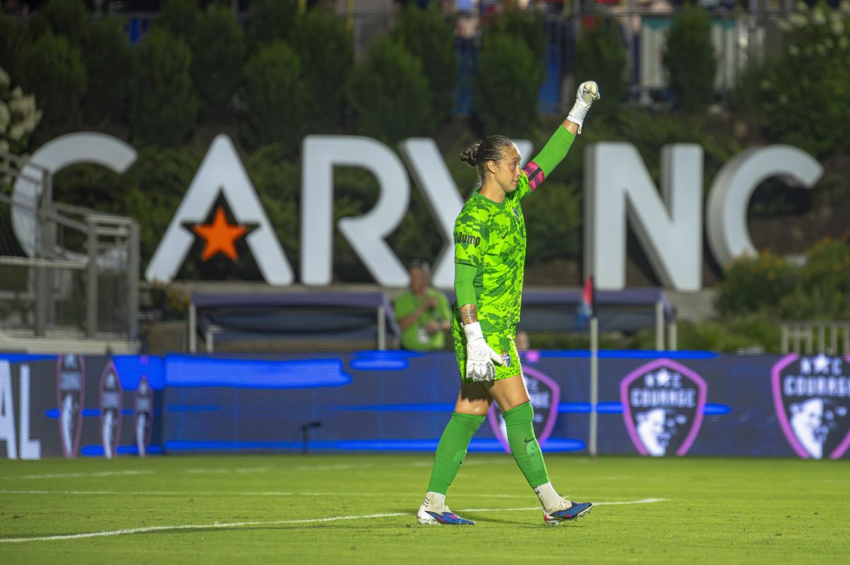 Goalkeeper Kailen Sheridan (1) raises her fist in celebration during the game against Seattle Reign FC in First Horizon Stadium at WakeMed Soccer Park on Saturday, July 4, 2026. NC Courage FC defeated Seattle Reign FC 3-1.