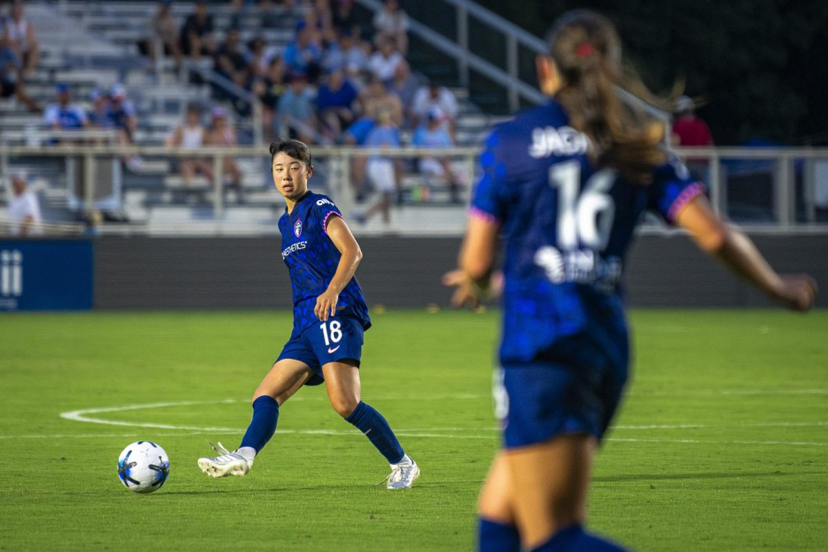 Defender Uno Shiragaki (18) passes the ball to midfielder Riley Jackson (16) during the game against Seattle Reign FC in First Horizon Stadium at WakeMed Soccer Park on Saturday, July 4, 2026. NC Courage FC defeated Seattle Reign FC 3-1.