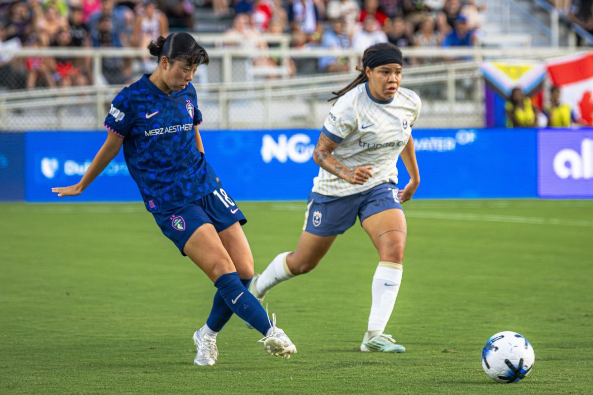 Defender Uno Shiragaki (18) makes a pass during the game against Seattle Reign FC in First Horizon Stadium at WakeMed Soccer Park on Saturday, July 4, 2026. NC Courage FC defeated Seattle Reign FC 3-1.