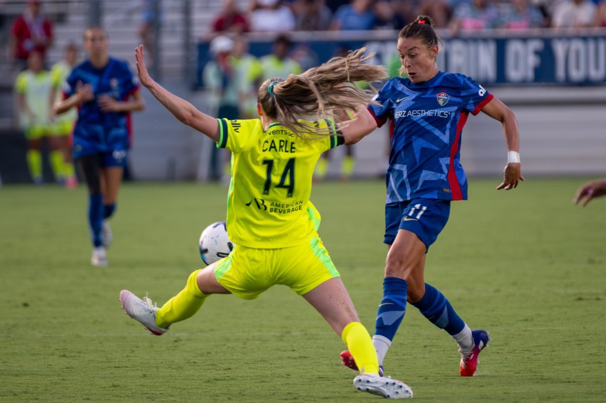 Defender Feli Rauch dribbles the ball during the match against Washington Spirit FC at First Horizon Stadium at WakeMed Soccer Park on Saturday, July 11, 2026. The Spirit beat the Courage 2-0.