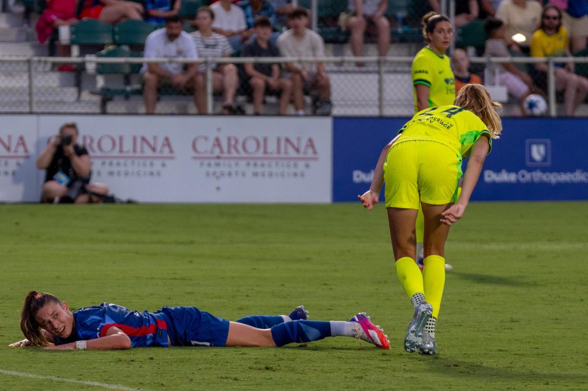 Defender Feli Rauch takes a fall during the match against Washington Spirit FC at First Horizon Stadium at WakeMed Soccer Park on Saturday, July 11, 2026. The Spirit beat the Courage 2-0.