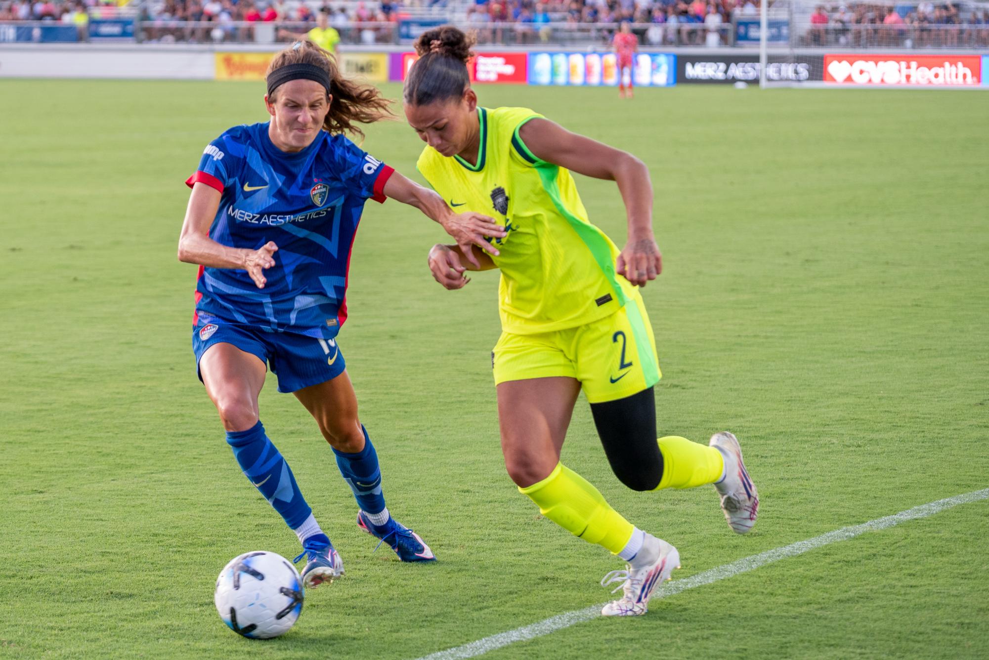 Defender Ryan Williams defends Spirit forward Trinity Rodman during the match against Washington Spirit FC at First Horizon Stadium at WakeMed Soccer Park on Saturday, July 11, 2026. The Spirit beat the Courage 2-0.