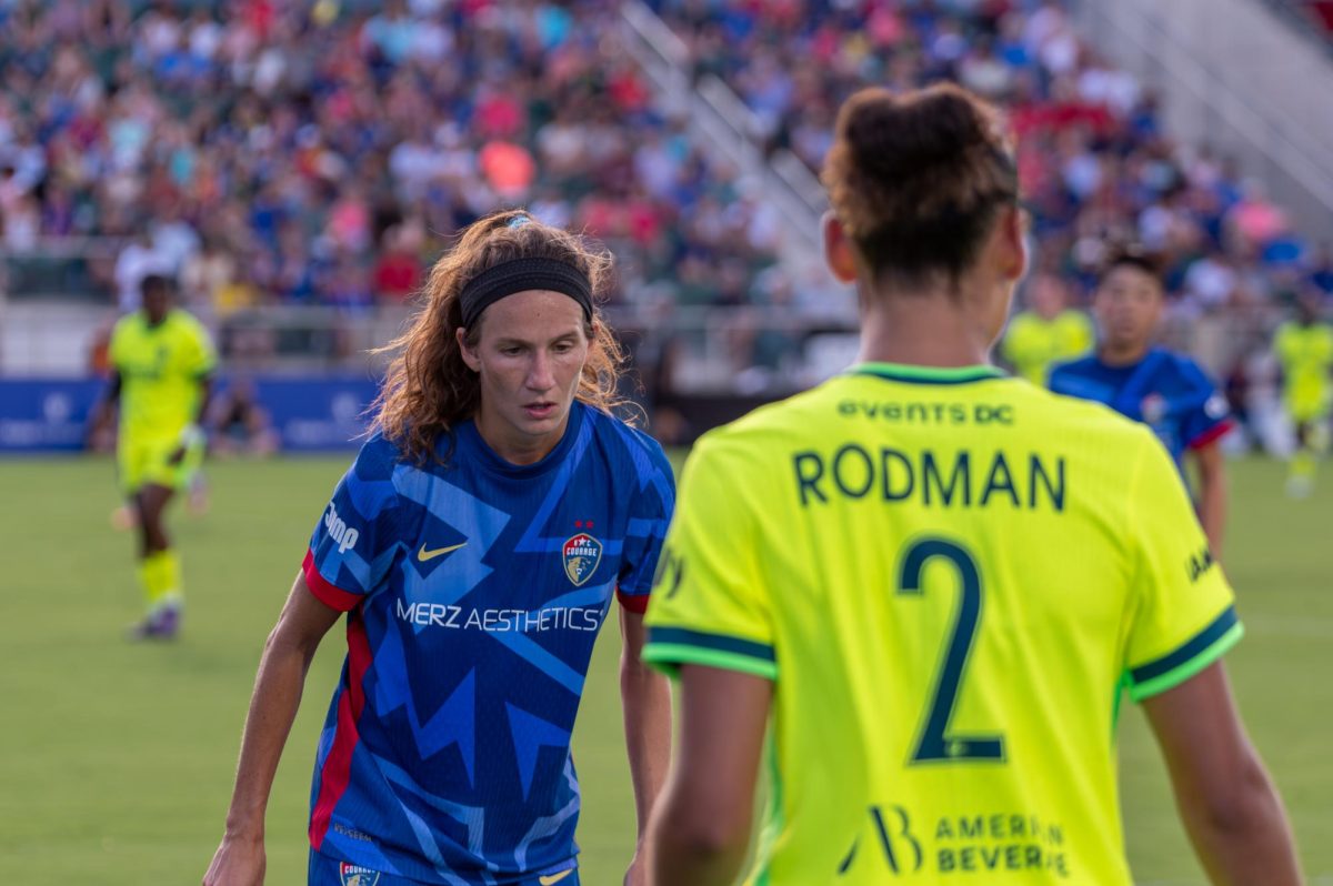 Defender Ryan Williams plays defense against Spirit forward Trinity Rodman during the match against Washington Spirit FC at First Horizon Stadium at WakeMed Soccer Park on Saturday, July 11, 2026. The Spirit beat the Courage 2-0.