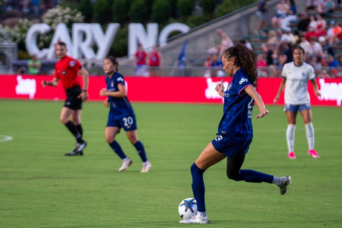 Defender Maycee Bell passes the ball during the game against Seattle at First Horizon Stadium at WakeMed Soccer Park on Saturday, July 4, 2026. North Carolina beat Seattle 3-1.