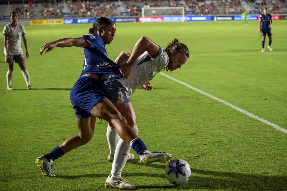 Forward Lauryn Thompson attacks the ball during the game against Seattle Reign FC in First Horizon Stadium at WakeMed Soccer Park on Saturday, July 4, 2026. North Carolina beat Seattle 3-1.